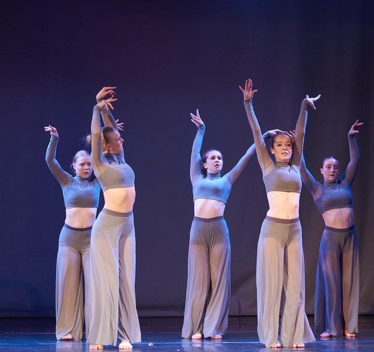 D2E Elites contemporary group in grey costumes at the annual stage show